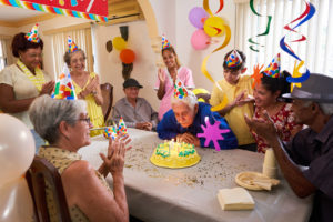 Senior living patients singing happy birthday in Brevard, NC - Tore's Home Inc